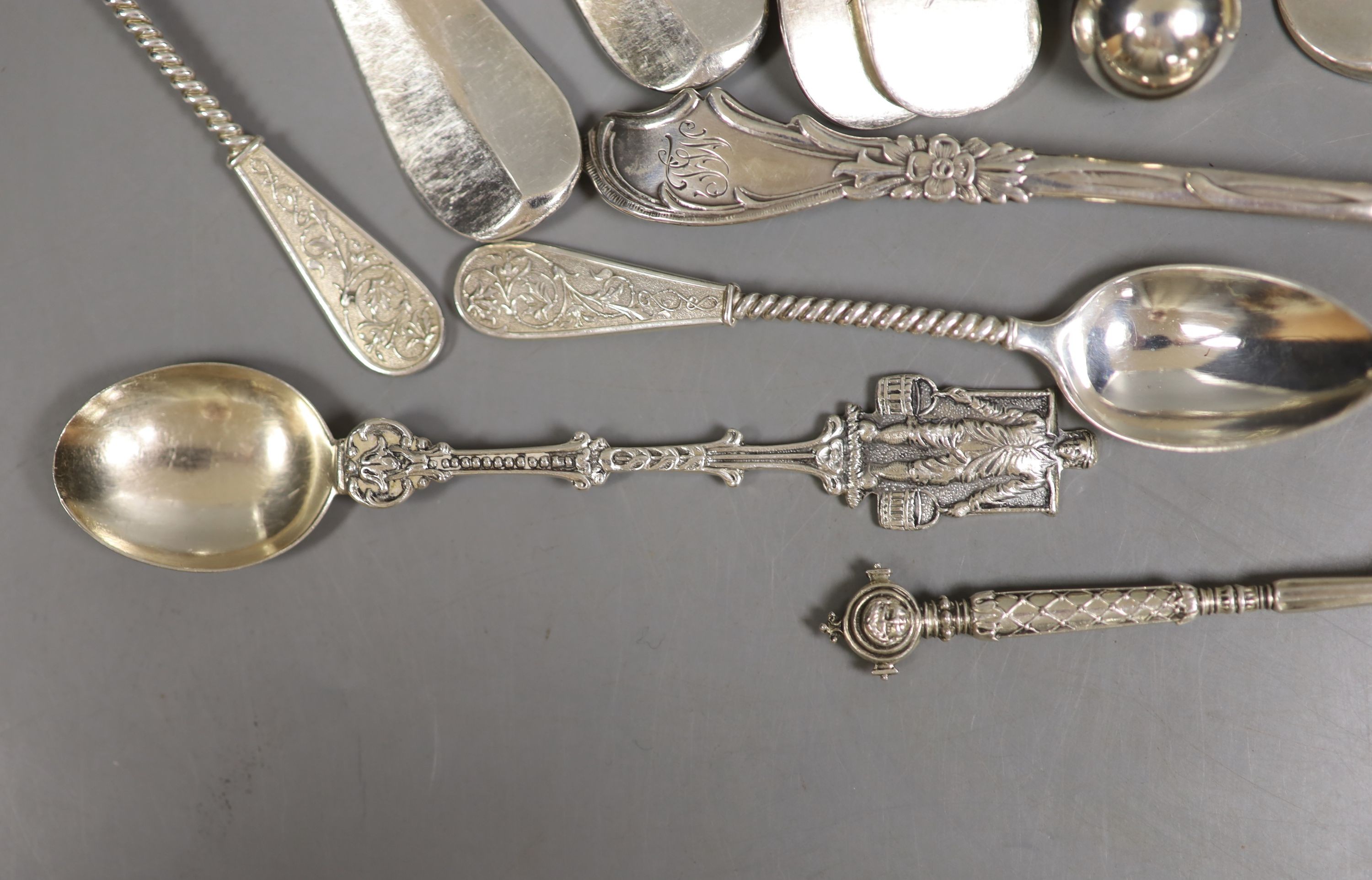 A pair of German 800 gilt white metal salts and a quantity of continental white metal flatware including French, Dutch and Austro-Hungarian, weighable white metal 13oz and a group of plated flatware.